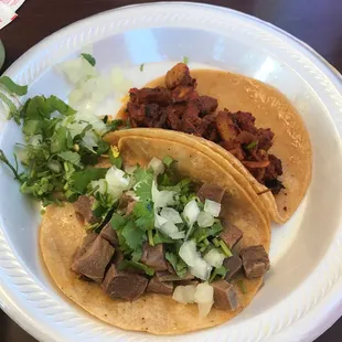 Tacos.   Came with cilantro and onions on the side, I prefer to have it already in my taco.