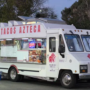 a food truck parked in a parking lot