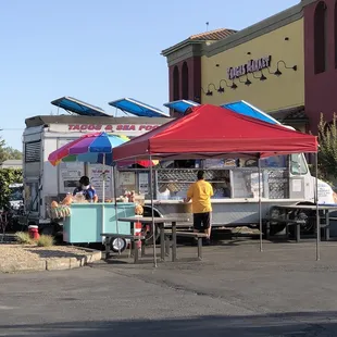 a taco stand and a food truck