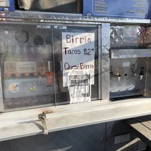 a taco truck parked in a parking lot