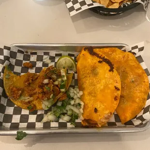 Red Tacos Queso Birria (left) Al pastor (right)