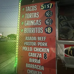 a food truck with a menu on it
