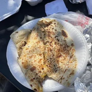 Huge quesadilla with but &quot;beef&quot; tasted horrible and was super greasy at the bottom
