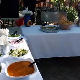 Wedding Catering with white linens and serving dishes