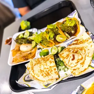 a tray of tacos calafia and broccoli