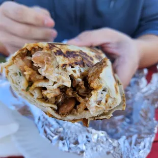 Inside of husband's al pastore super burrito. There was more meat than pictured!