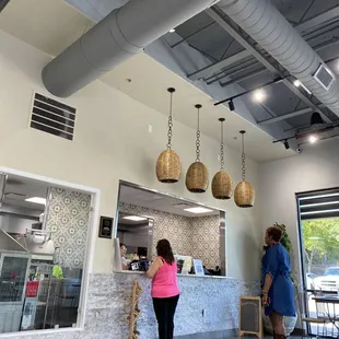 Ordering window with view of super clean kitchen and fresh homemade tortillas!