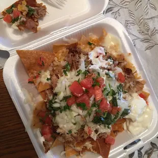 Carnitas nachos with everything!!