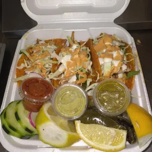 Tacos served with all the fixings!