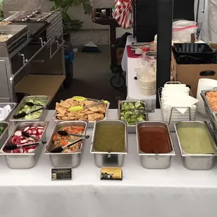 Condiments table looks ready to go :)