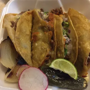 Quesa tacos lengua and birria