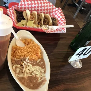 Order of Tacos and side of Rice and Beans