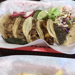 Order of Tacos left to right Carnitas, Al Pastor and Barbacoa