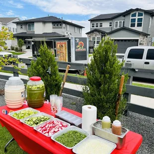 a red table with food on it
