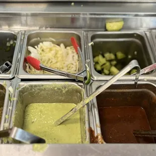 Salsa/condiments bar.