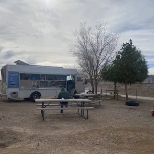 a food truck parked in a desert