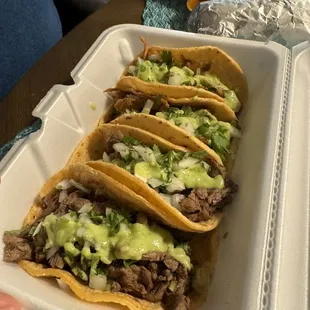 Carne asada and pastor tacos con todo