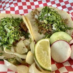 Barbacoa and tripa tacos