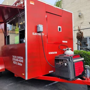 a taco truck parked in a parking lot