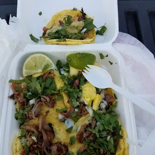 Al pastor mini tacos with fresh cut pineapple bits. Not shown is the cup of frijoles a la charra included.