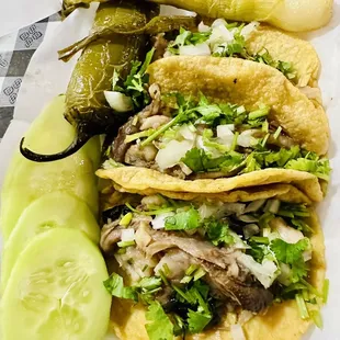 Tacos de cabeza (veil head tacos )  With a Chile toriado &amp; grilled onions.