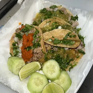  plate of tacos and cucumbers