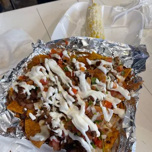 Asada Nachos and street corn