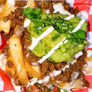 Carne Asada Fries! Meat, pico de gallo, sour cream, queso, and guacamole