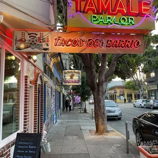 a neon sign for a taco restaurant