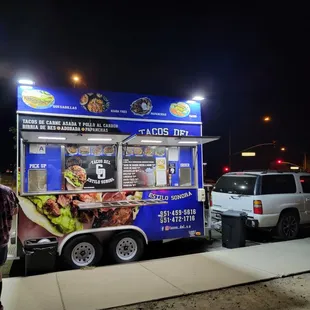 a food truck parked in a parking lot
