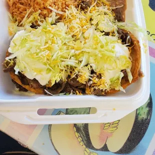 2 sopes w/ carne asada rice &amp; beans