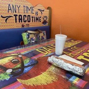 Cute booth, breakfast burrito will last all day!