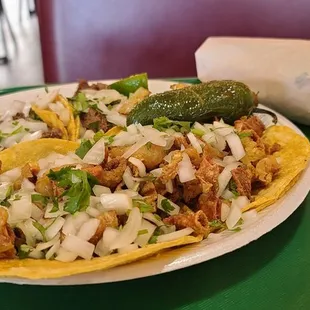 Combination plate of Lenga and tripas .