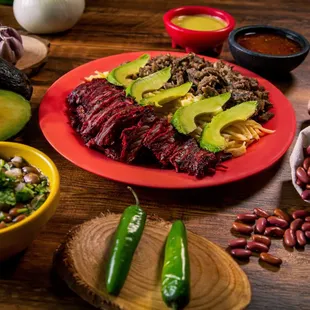 Monterrey 400 - Combo of trompo and bistec, topped with asadero cheese and avocado, and accompanied with tortillas!