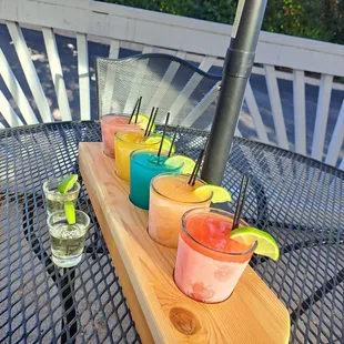 a row of colorful drinks