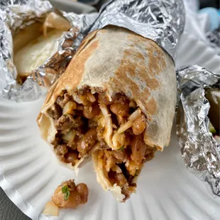 Carne asada regular burrito with spicy salsa ! Maybe too hot for some, but I love it !