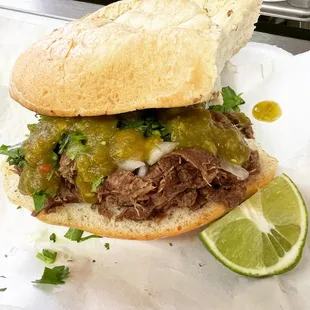 a beef sandwich on a bun