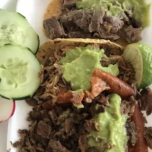 Tacos with carnitas, asado, and lengua.