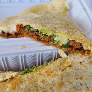 The quesadilla with al pastor, was an "A+."  Great flavor and really filling, they cut it into 3 pieces, it's a full meal.