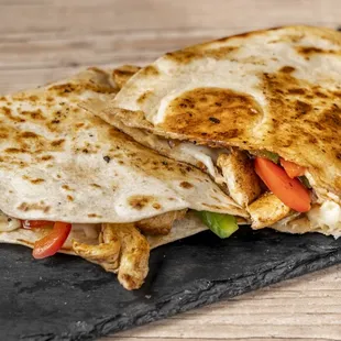 Chicken Quesadilla - 
12 inch flour tortilla filled with your favorite combination