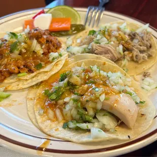 three tacos on a plate