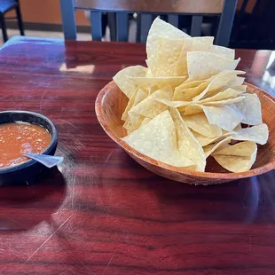 Warm fresh tortilla chips and tasty mild salsa.