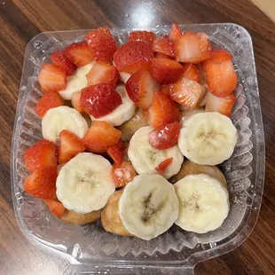 Strawberries and bananas on top of pancake bites