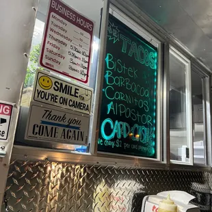 a food truck with menus