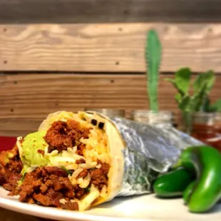 Hungry? Try Don Ramon&apos;s remedy: burritos! Pictured here with carne al pastor (marinated pork).