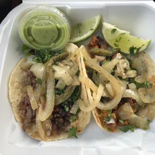 a close up of a taco in a styrofoam container