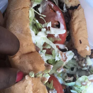 Steak Torta. More like a steak and cheese sub with beans on it.