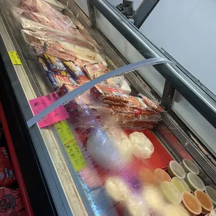 a deli case filled with fish