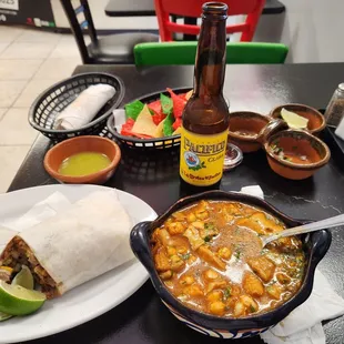 Menudo and carnitas burrito