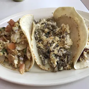 Migas, steak and Egg on house made corn tortillas, bacon and egg on flour